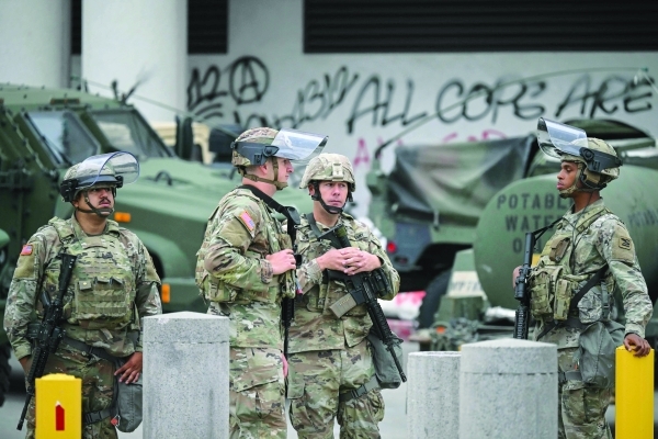 Marines arrive in LA under Trump orders as protests spread