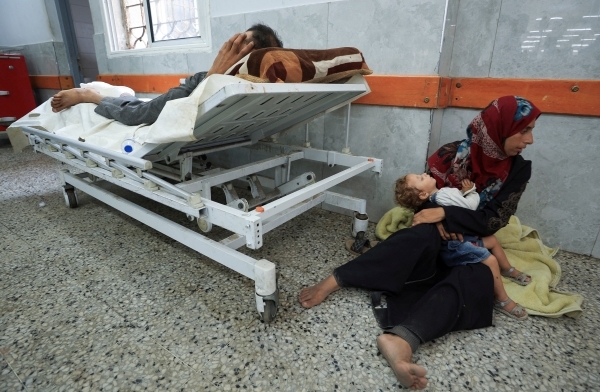 Israeli fire kills 35 in Gaza, many near an aid site, medics say