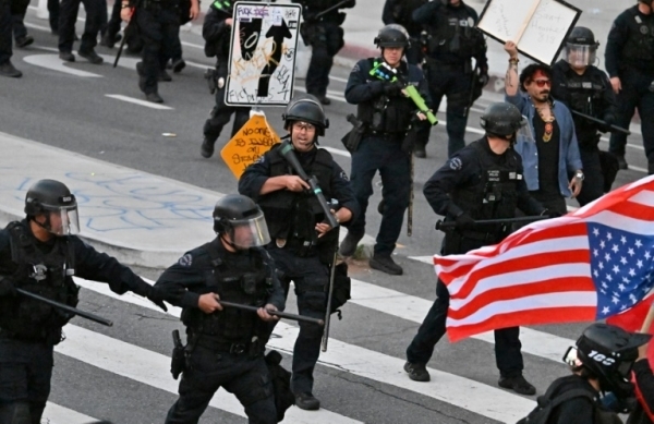 Protests spread across US despite Trump threats