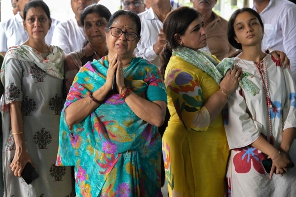 Indians wait for remains after crash
