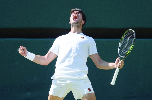 Alcaraz subdues Fritz to reach third successive Wimbledon final