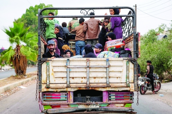Syria evacuates Bedouins from Sweida as ceasefire holds