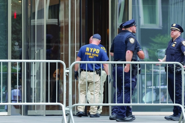 Gunman kills four in New York skyscraper shooting spree