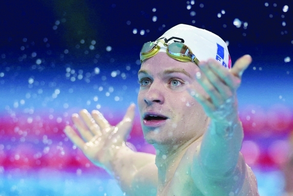 Marchand smashes 200m medley world record