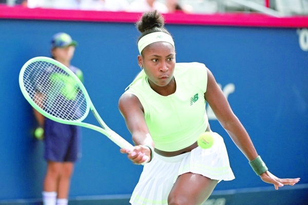 Gauff fights back to advance, Medvedev crashes out