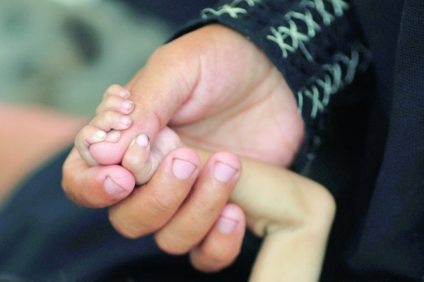 Gaza dad grieves, fights to save children from malnutrition