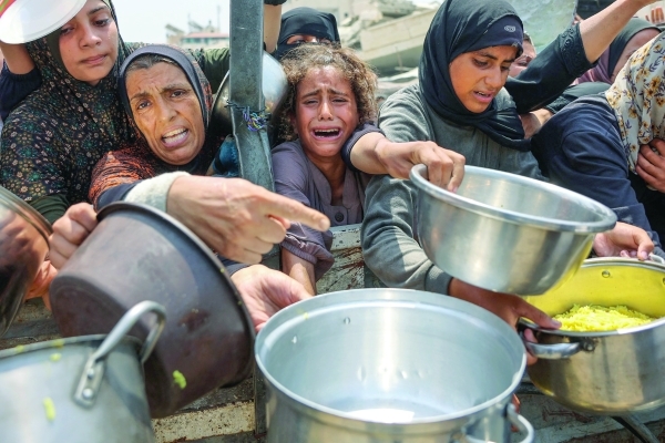 Amid global condemnation, Israel approves Gaza plan