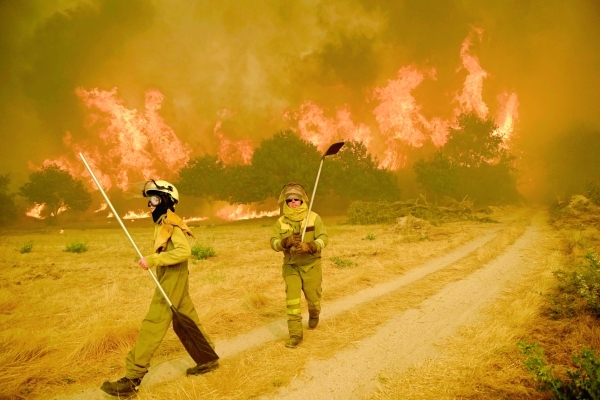 Spain battles 14 fires with more expected amidst intense heat