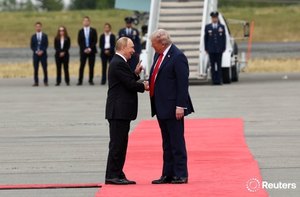 Trump, Putin shake hands in Alaska