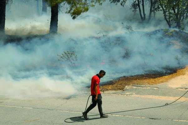 Portugal wildfires claim first victim, as Spain on alert
