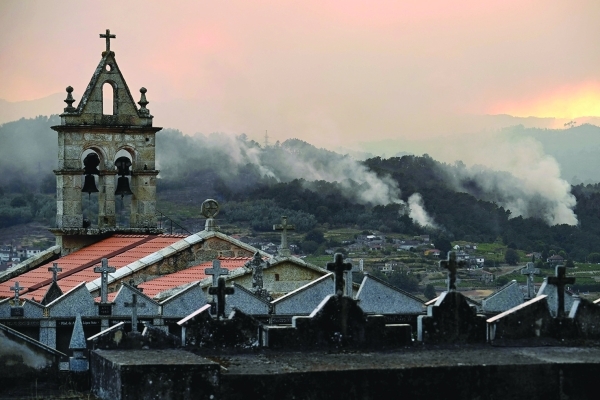 Spain and Portugal battle wildfires as death toll mounts