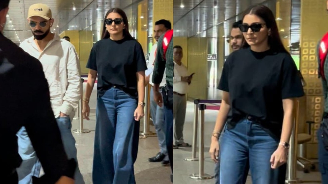 Airport OOTD: Anushka Sharma flaunts her obsession with panel oversized denim jeans as she gets clicked with Virat Kohli