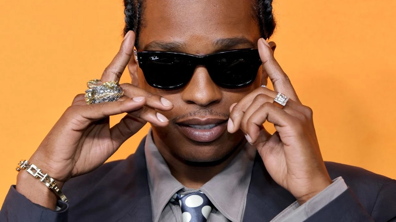 Fashion Swap: A$AP Rocky Wears Rihanna's Suit and Polka Dot Tie For a Red Carpet Event