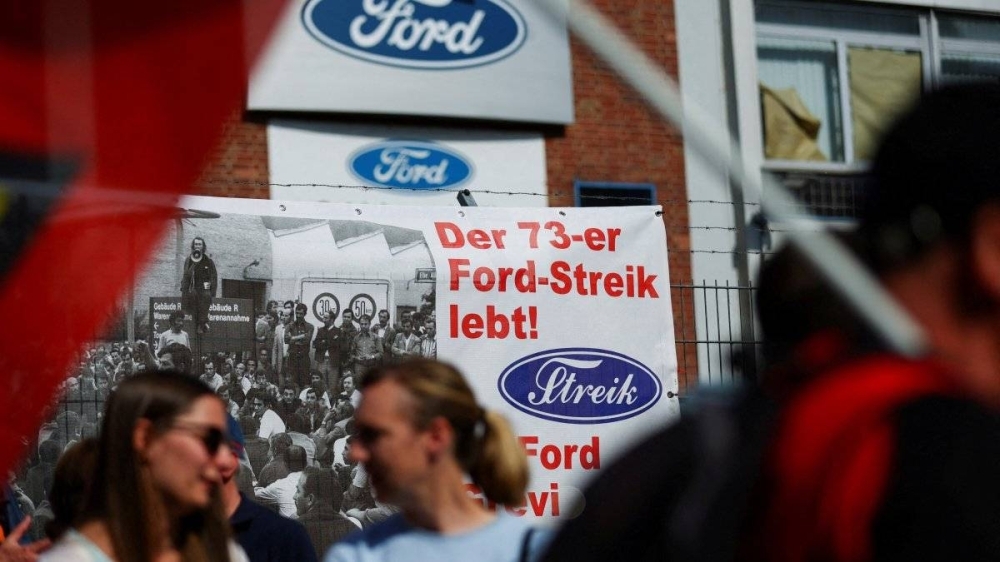 Ford workers in German Cologne stage historic 1st strike