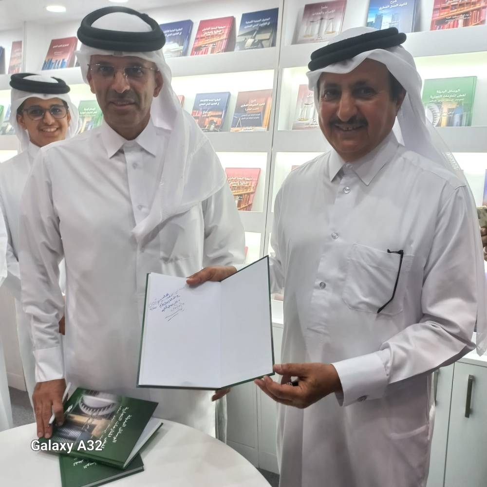 QC chairman attends launch of QICCA member's book in Doha
