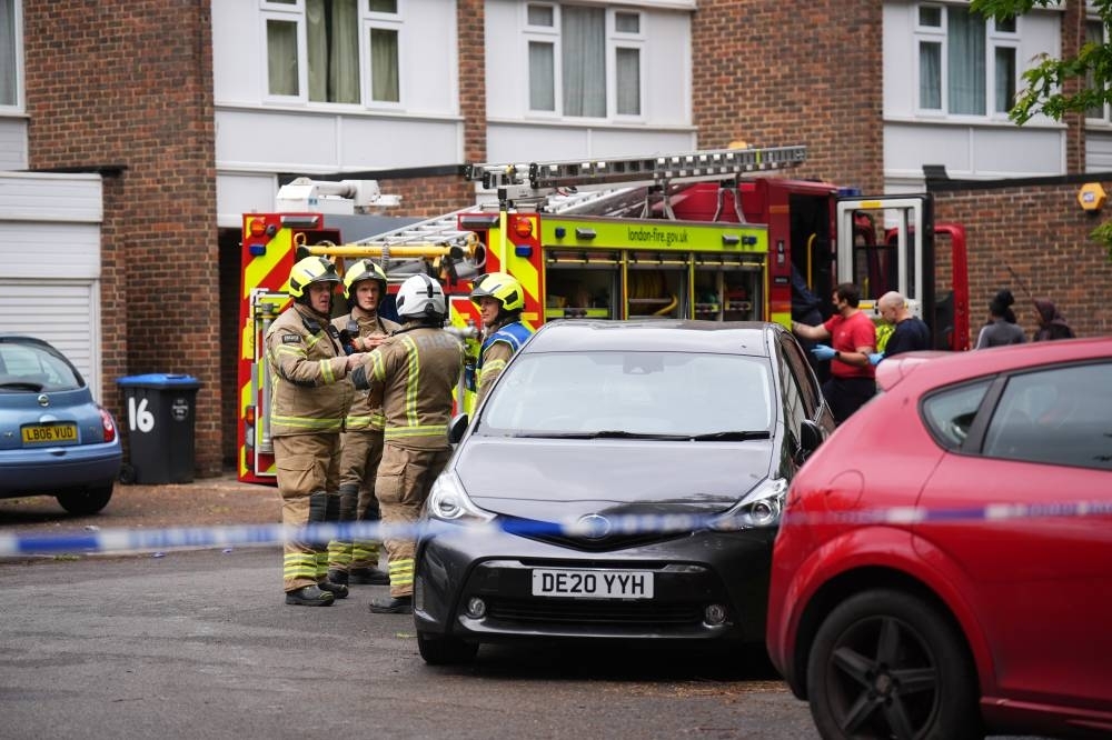 Murder arrest after three children and woman die in London house fire