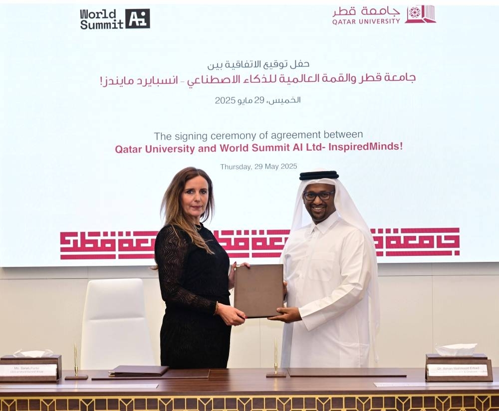 QU and World Summit AI Qatar sign MoU