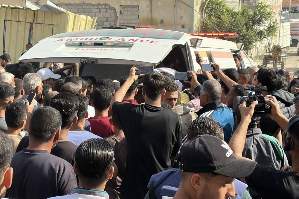 Israel attacks kill 32 Palestinians waiting for food at Gaza aid sites