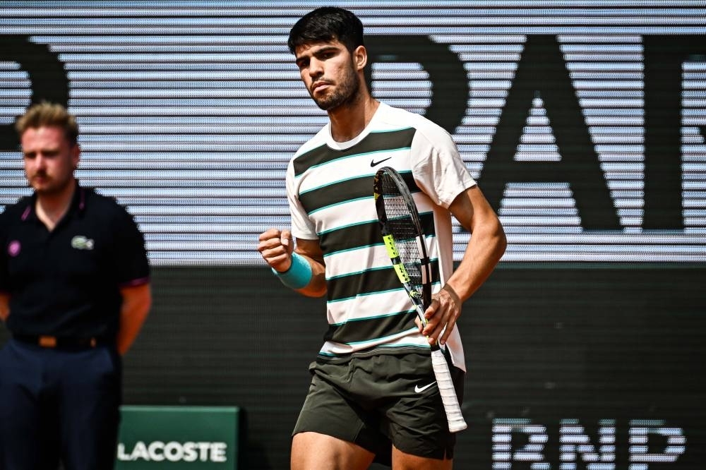 Alcaraz defends French Open title after epic tussle with Sinner