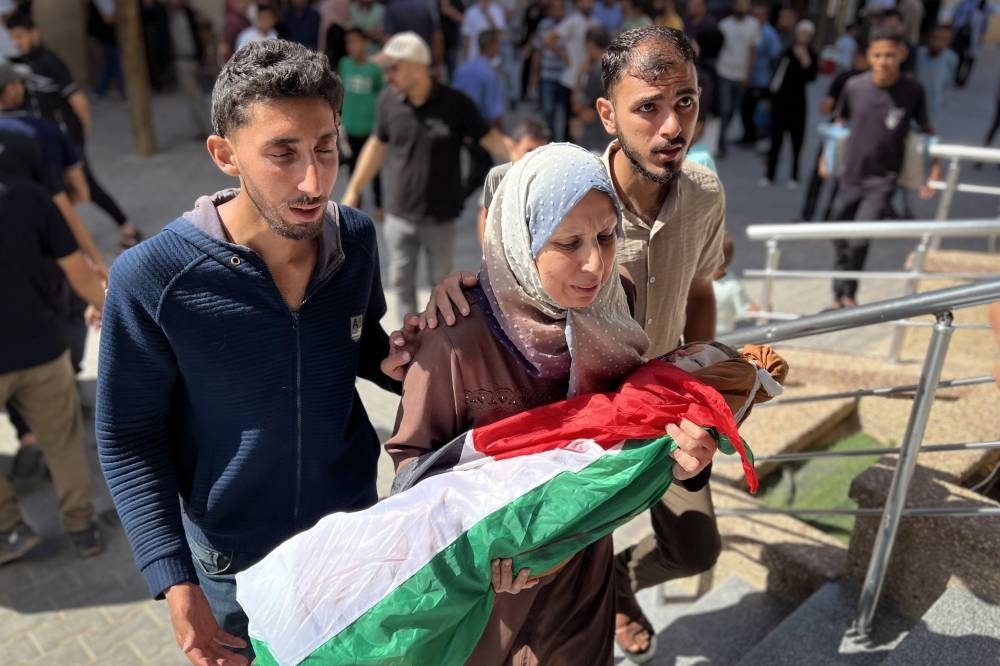 Israeli attacks kill at least 51 as Trump signals ‘great progress' in Gaza talks