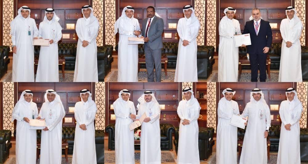 QIIB honours group oflong-serving employees