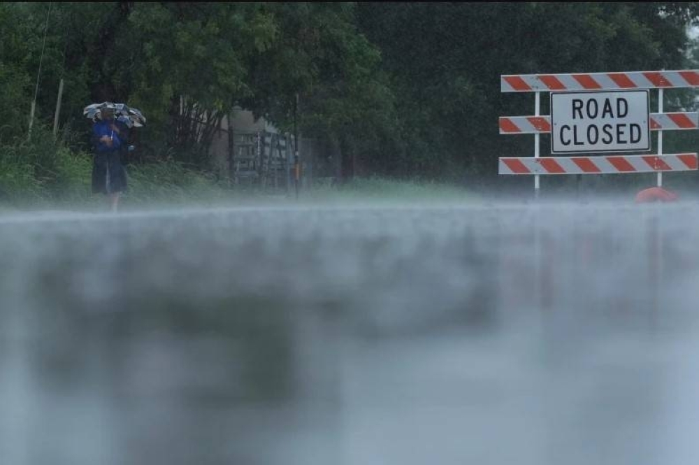 Search for Texas flood victims paused as heavy rains bring new threat