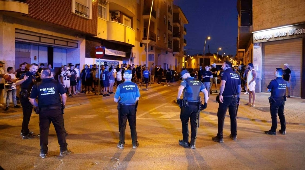 Spain arrests eight after far-right groups and migrants clash