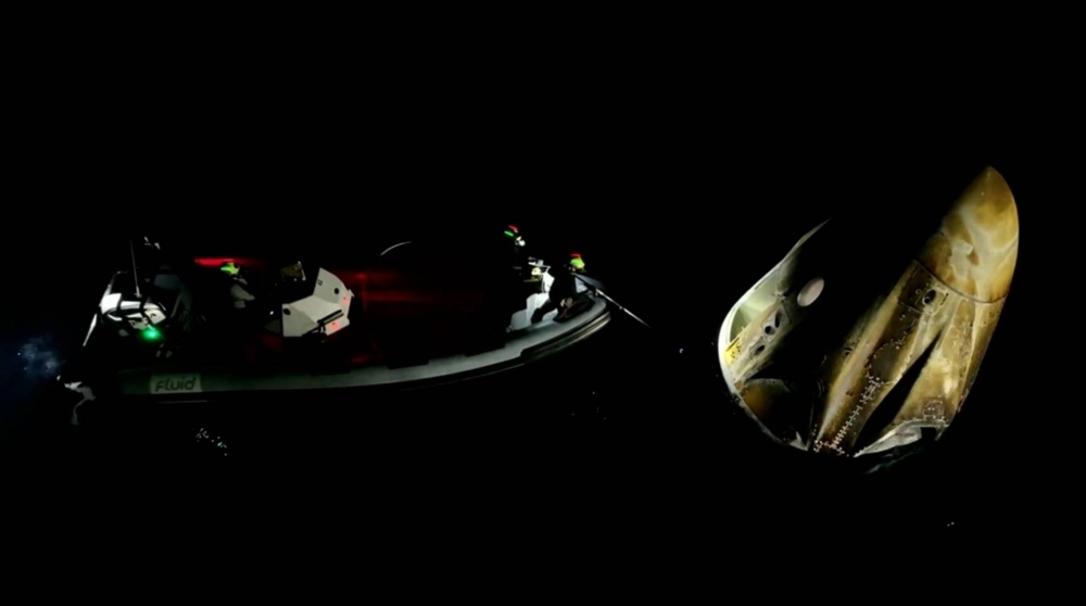 Private space crew returns to Earth after stay at ISS