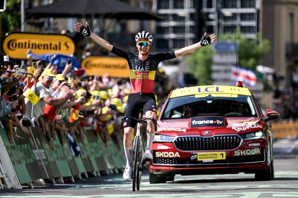 Wellens enjoys stage win as Pogacar retains yellow jersey