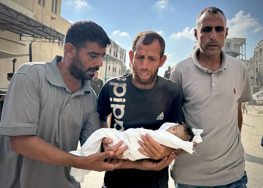 At least 49 killed in Gaza attacks as Israel sends tanks into Deir el-Balah
