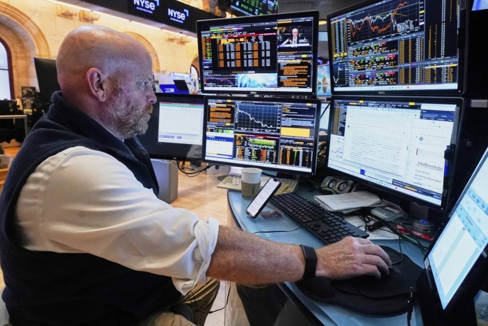 Wall Street coasts for now ahead of week packed with potential flashpoints