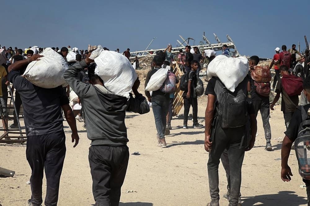 At least 92 killed in Israeli attacks across Gaza