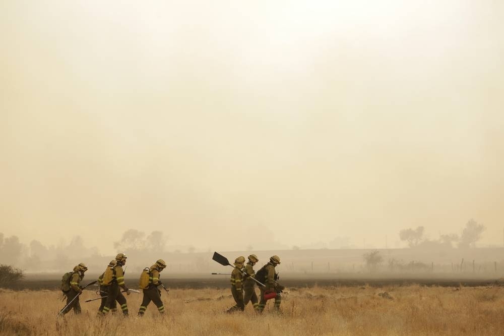Spain suffers third wildfire death as thousands remain displaced in Europe