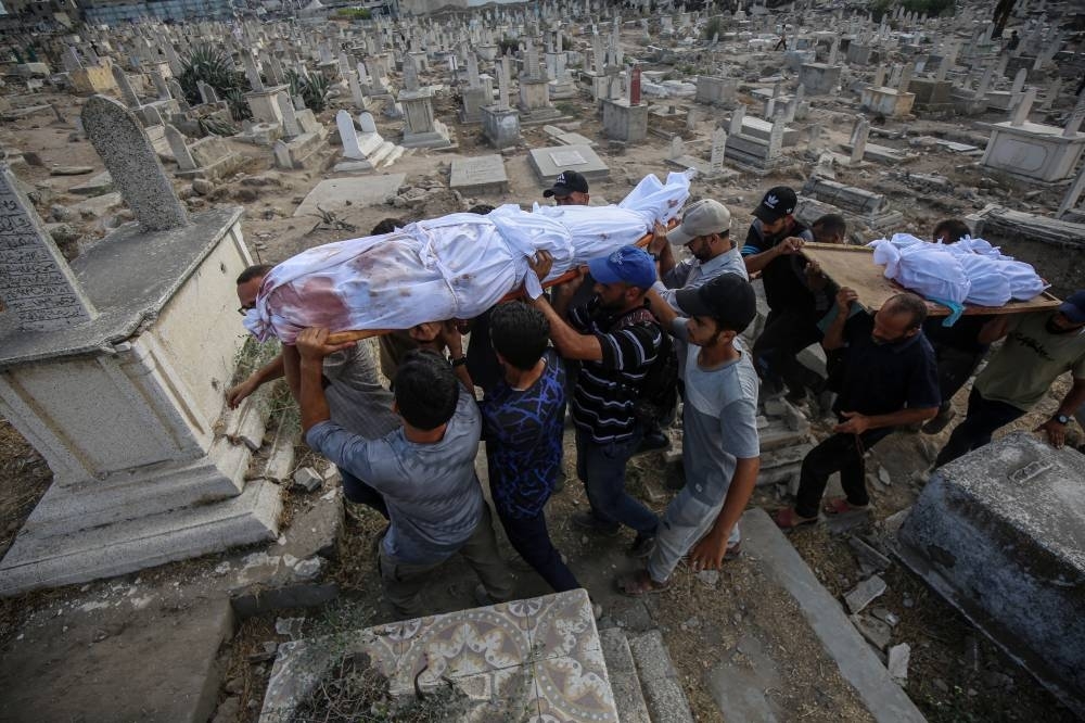 Starving Palestinians flee as Israel intensifies attacks on Gaza City