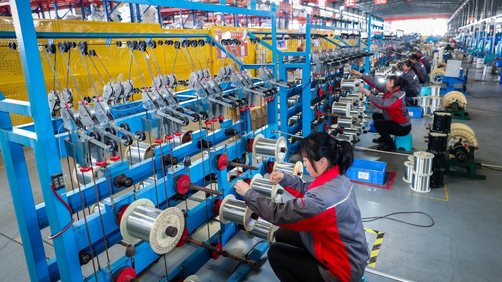China's factories slow, but consumers unexpectedly perk up