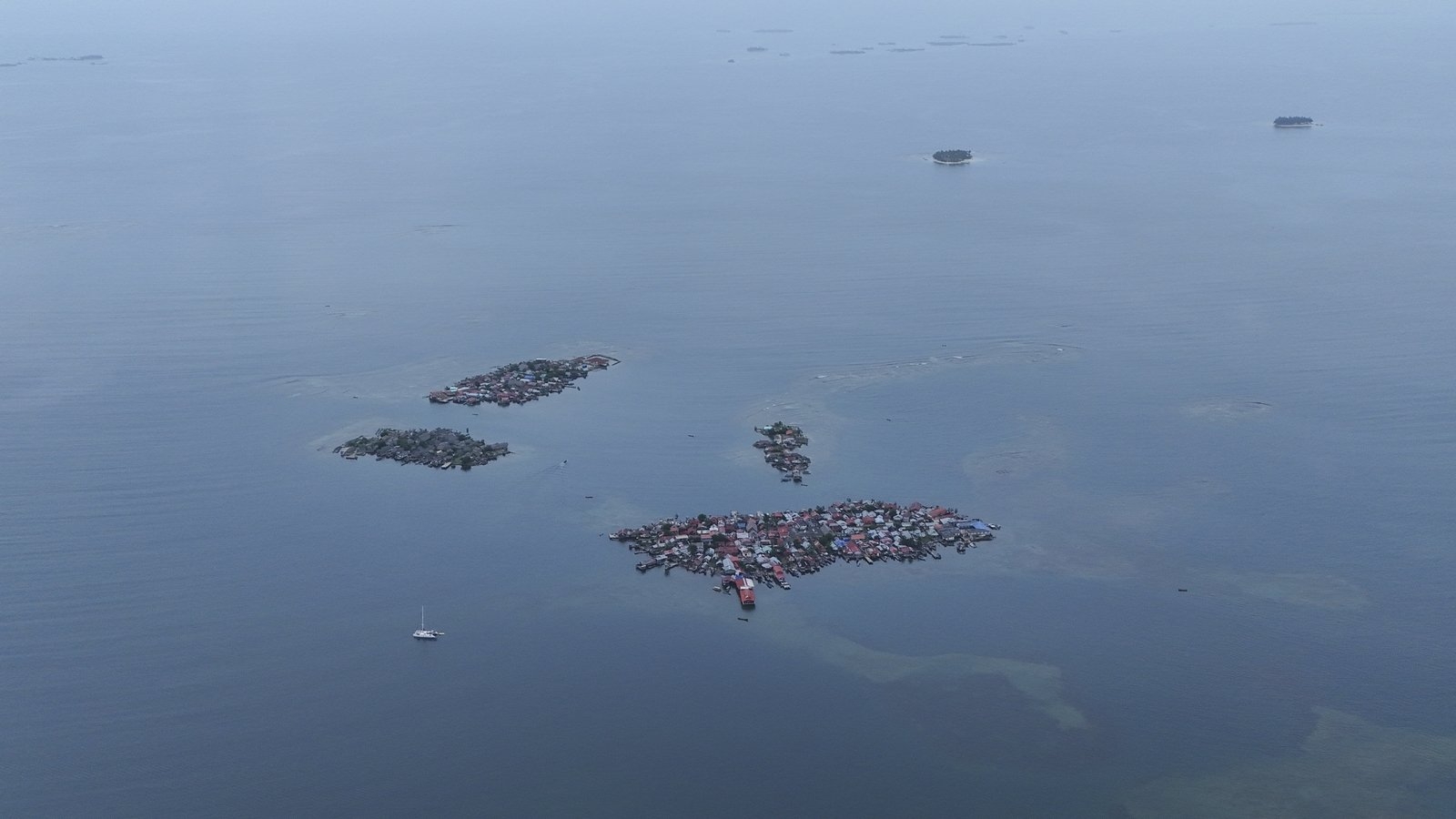 Year after exodus, silence fills Panama island threatened by sea