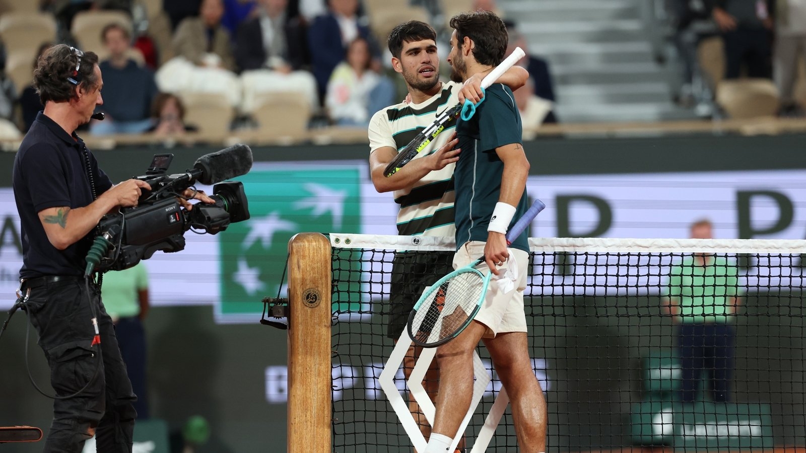 Carlos Alcaraz into final as Lorenzo Musetti forced to retire injured
