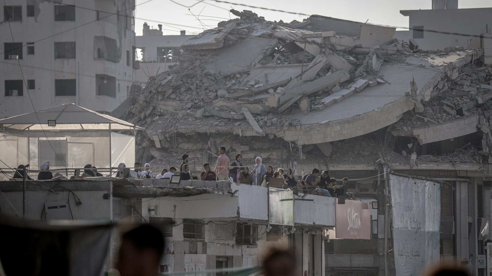 US-backed Gaza group suspends aid for a day over threats