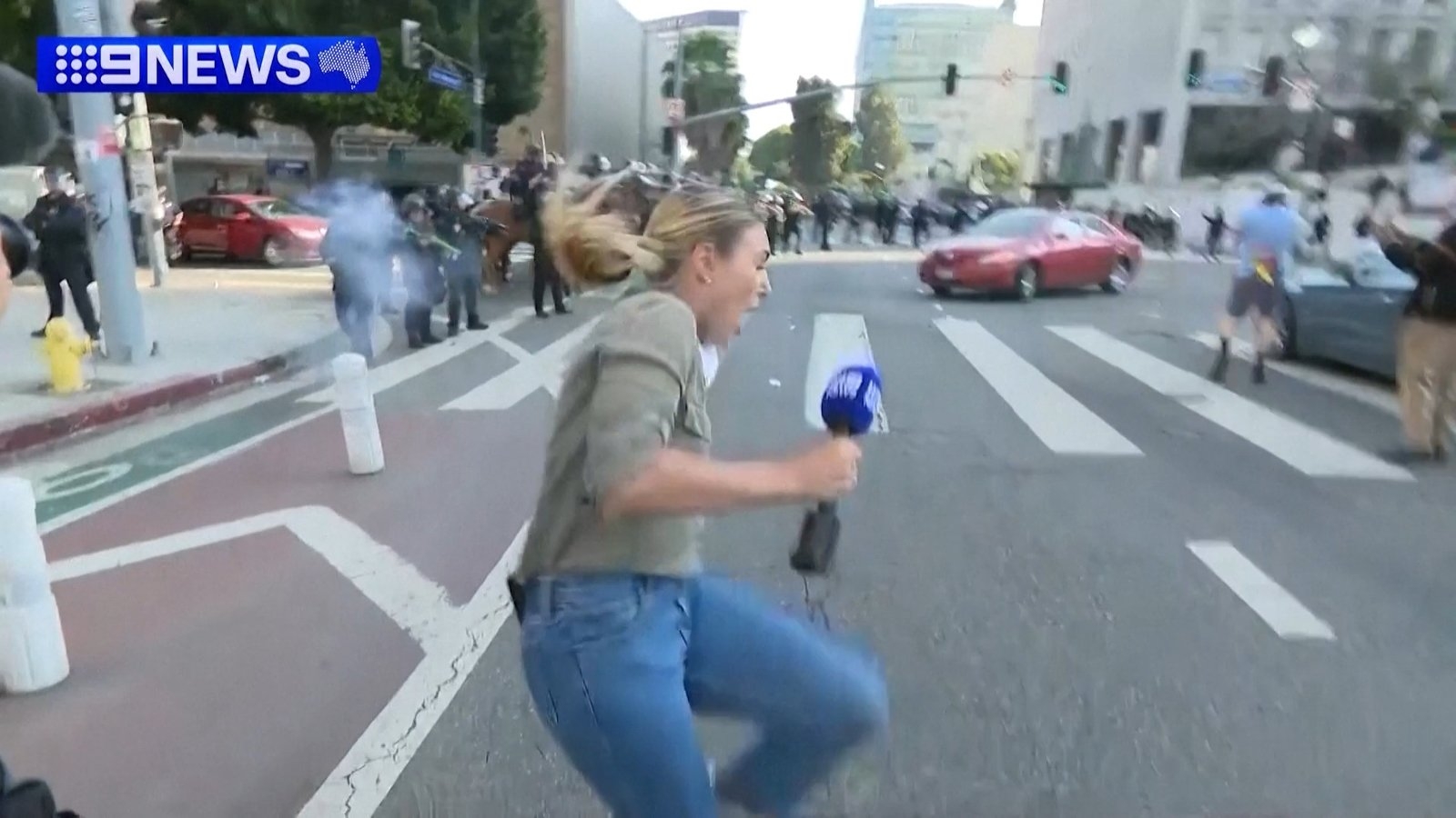 Watch: Reporter safe after being hit by rubber bullet amid unrest in LA