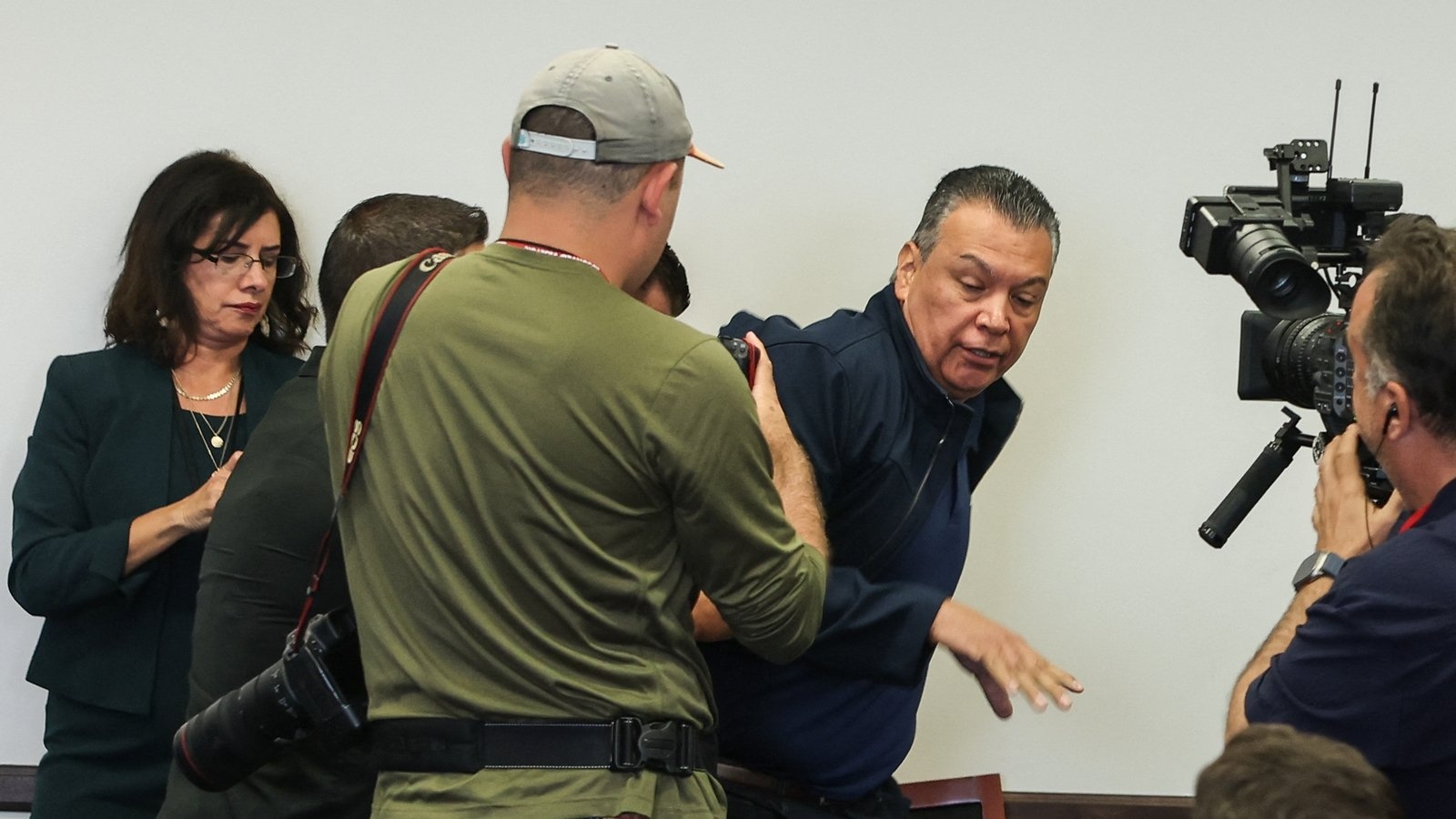 US senator manhandled, handcuffed at Trump official's press conference