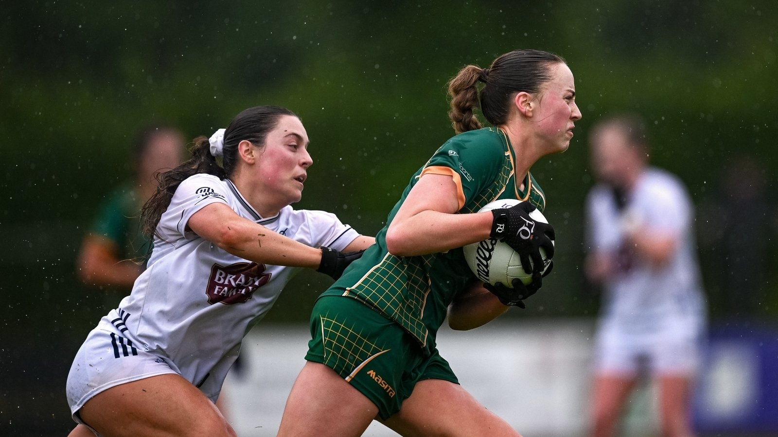 Meath battle past Kildare and the elements to progress to last eight