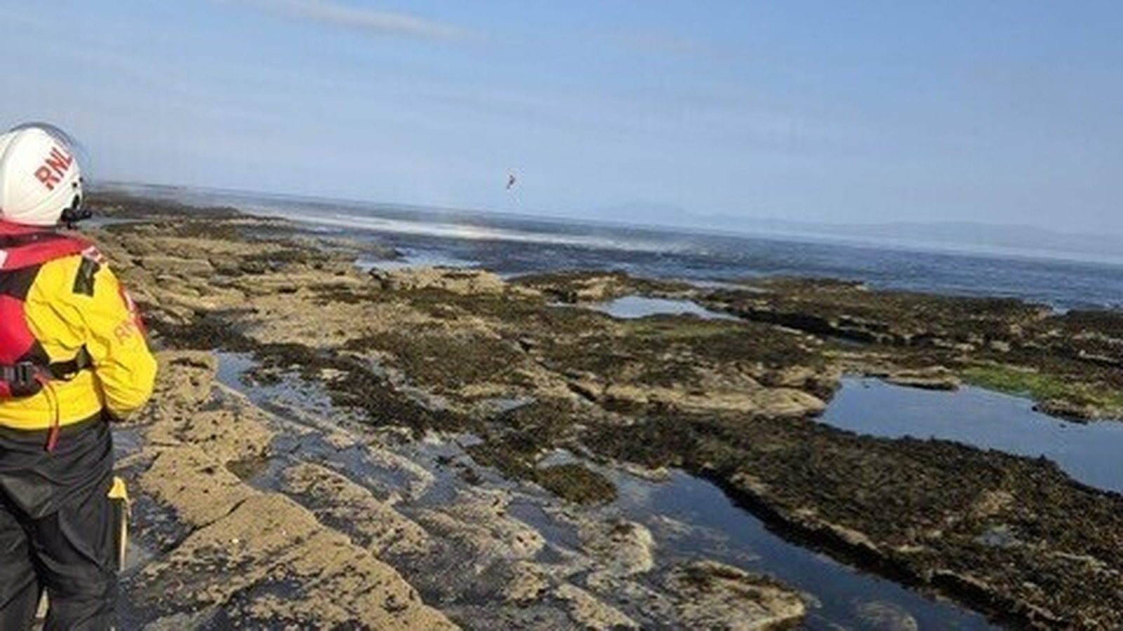 Two people rescued after separate falls from cliffs