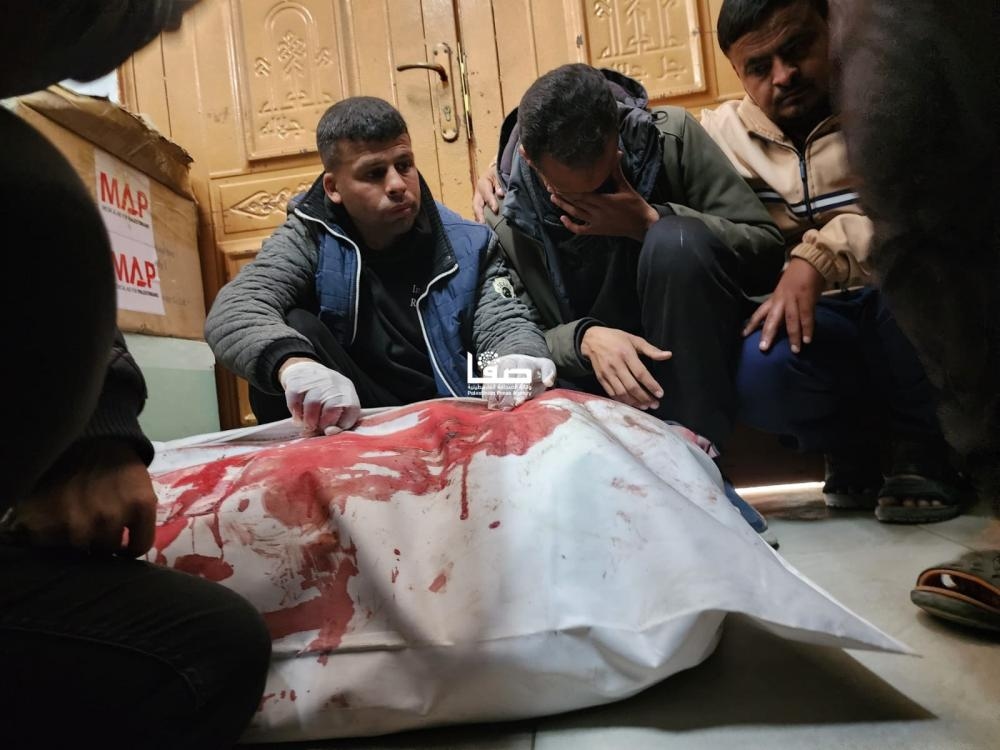 Gaza: 48 martyrs recovered from 1 random grave near Kamal Adwan Hospital