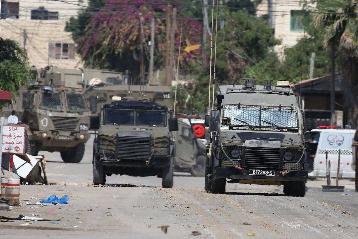 Zionist enemy forces storm Kafr Malik near Ramallah & Al-Khader Town South of Bethlehem