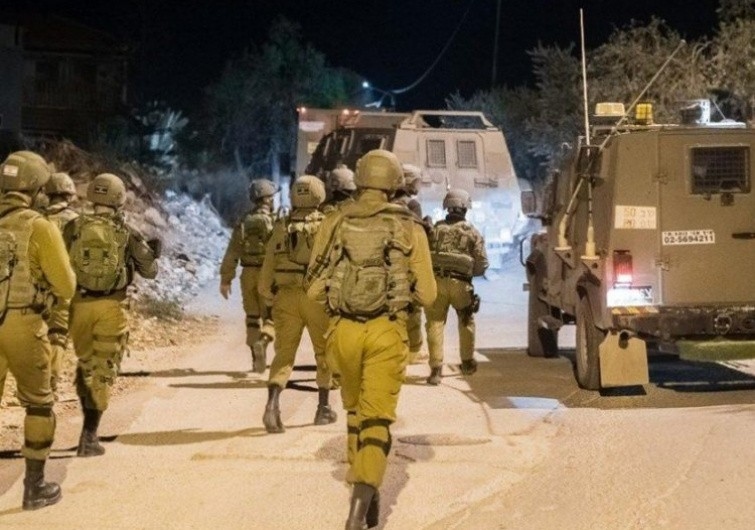 Israeli occupation forces raid Al-Bireh city and Kafr Malik village