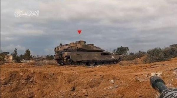 Al-Qassam Brigades target zionist "Merkava" Tank south of Khan Younis