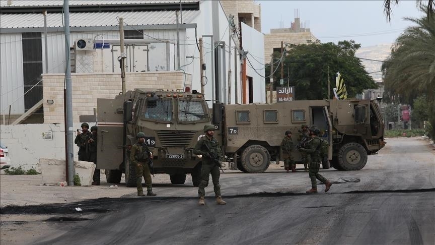 Israeli enemy forces storm multiple towns & villages in West Bank