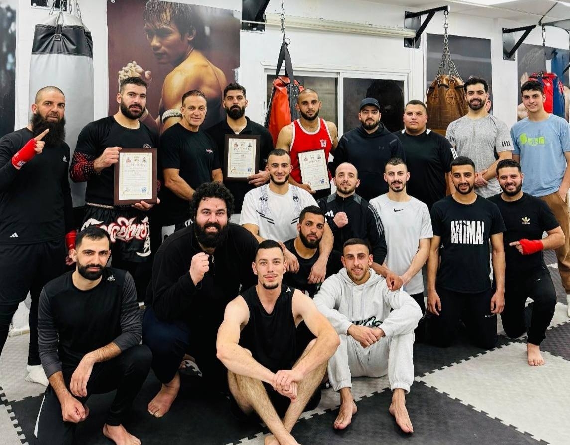 الماستر خالد عليان يسلم المدربين شرف والقاق وكنعان شهادات الترقية الدولية