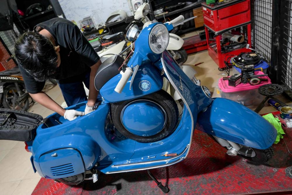 Vespa love affair: Indonesians turn vintage scooters electric