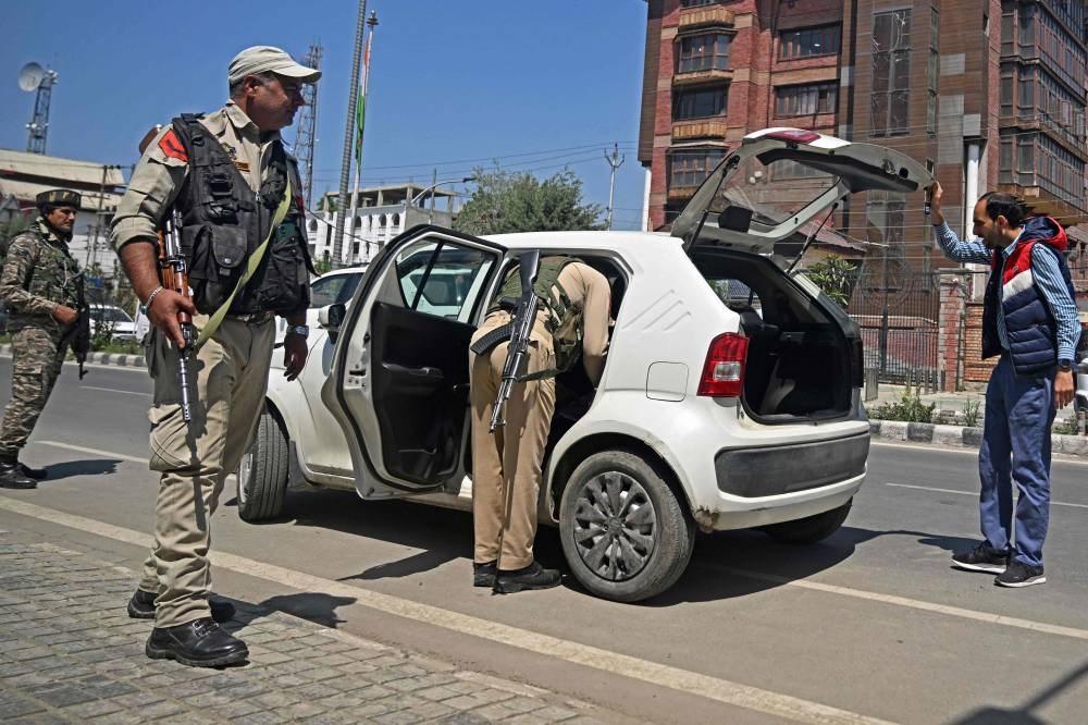 Pakistan says India planning strike after deadly Kashmir attack